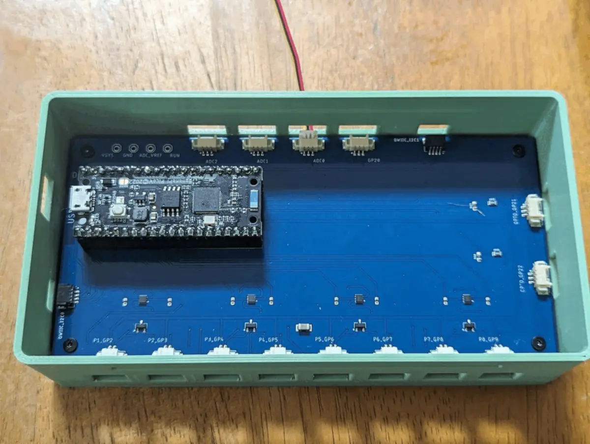 GrowMax board in its case, microcontroller in the headers